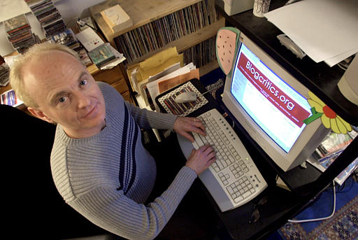 In this photo, Eric Olsen works on his media review blog in 2002. Olsen said because the U.S. copyright laws prohibit breaking copy-protection measures used on DVDs, even for commentary and other legally permitted "fair uses", he won't be able to offer sound snippets from movies and bonus materials on DVDs. Fair use is a copyright concept that allows works to be used in ways that otherwise would infringe on the copyright but are allowed because the uses are particularly beneficial to society and not particularly harmful to the copyright owner. Fair use thus limits the rights of copyright. (AP Photo/Tony Dejak, used with permission from the Associated Press)