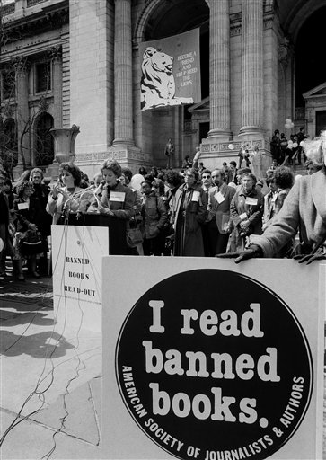 The right to receive information and ideas as part of First Amendment protections for citizens has been emphasized in cases involving banned books at libraries, distribution of religious literature and commercial speech. In this photo, Gail Sheehy, author of "Passages," at podium, right, reads during the "First Banned Books Read Out" in New York, April 1, 1982. The rally protested censorship by school and public libraries of certain books under pressure from right wing religious groups. (AP Photo/Carlos Rene Perez, used with permission from The Associated Press.)