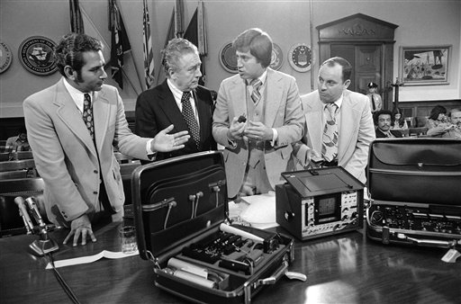 In Bartnicki v. Vopper, 532 U.S. 514 (2001), the Supreme Court found that the First Amendment protects speech that discloses the contents of an illegally intercepted communication. In this photo, Anthony Zavala, left, a former Houston policeman, and three other witnesses look over wiretapping equipment prior to testifying before the House Intelligence Committee in Washington on Oct. 9, 1975. (AP Photo/Charles Gorry, used with permission from the Associated Press)