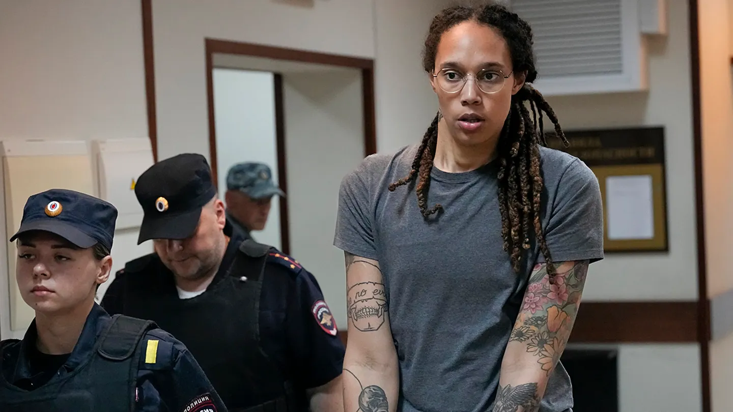 WNBA star and two-time Olympic gold medalist Brittney Griner is escorted from a courtroom after a hearing, in Khimki just outside Moscow Aug. 4, 2022. (AP Photo/Alexander Zemlianichenko, File)