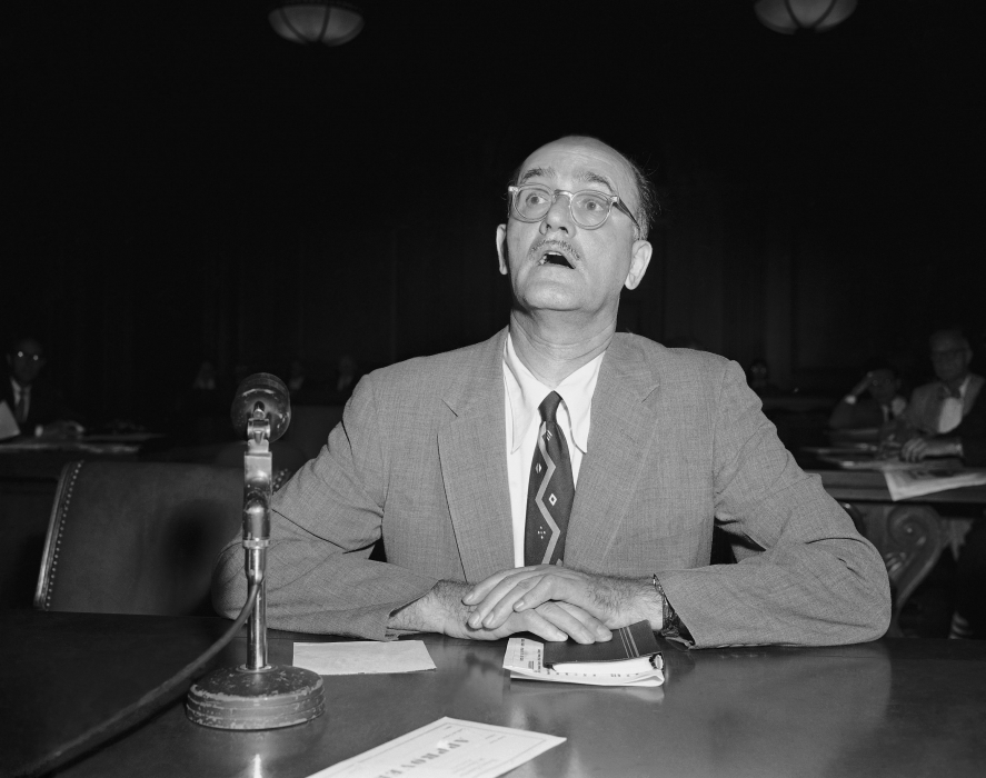 The Supreme Court in Roth v. United States (1957) created a new test for courts to determine whether something was unlawfully obscene. At issue was the federal indictment of Samuel Roth, a book and magazine publisher who had been charged with sending obscene materials through the mail. In this 1955 photo, Roth testifies before a Senate subcommittee investigating the effect of pornographic material upon juvenile delinquency. (AP Photo/JH, used with permission from the Associated Press)