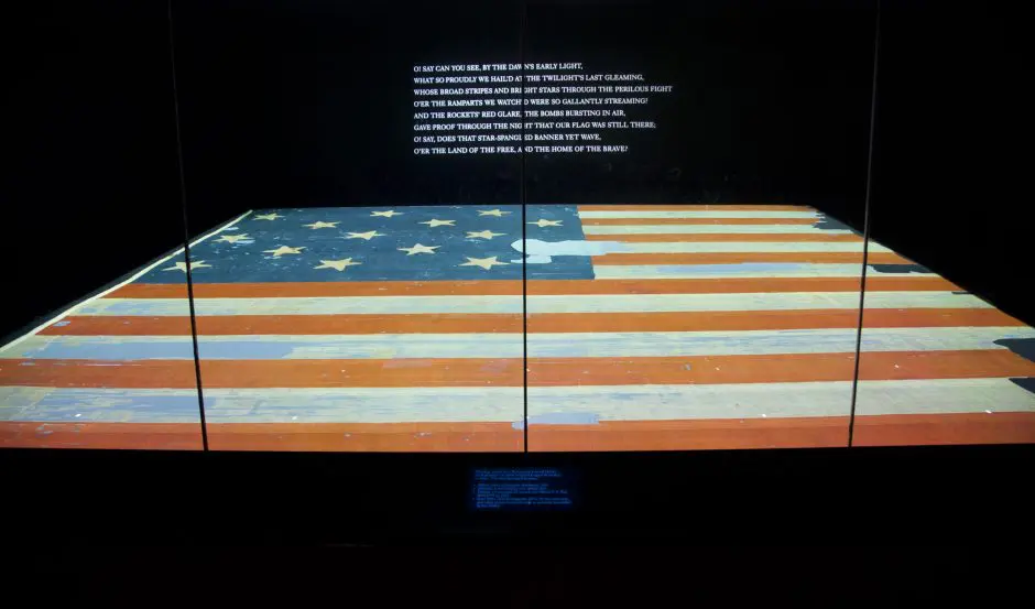 During the 1980's, I visited the National Museum of American History of the Smithsonian Institution(NMAH). At that time, they had on display the inspiration for our national anthem, the Star Spangled Banner. This is the flag that flew over Fort McHenry when the British attacked it on Sept. 13, 1814. Francis Scott Key, a lawyer, had boarded a British ship to try to secure the release of a doctor held prisoner by the British. Key was not able get off the ship before the British fleet started attacking Ft. McHenry. When the bombing stopped, Key looked out and saw this flag flying defiantly over the fort and wrote down his feelings in a poem that would eventually become our national anthem.
