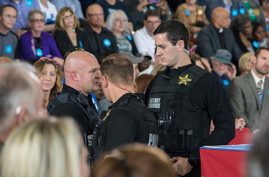 Uniformed Secret Service agents in Akron, Ohio on Oct. 3, 2016. The U.S. Supreme Court has ruled many times that government officials are entitled to qualified immunity in First Amendment lawsuits, meaning they might not face liability for violating someone's constitutional rights if the law was not settled or known at the time of the conduct in question. In Wood v. Moss in 2014, Secret Service agents who removed protestors away from President George W. Bush were granted qualified immunity against a challenge that the protestors First Amendment rights of speech were violated. (Photo by Tim Evanson, CC by SA-2.0)