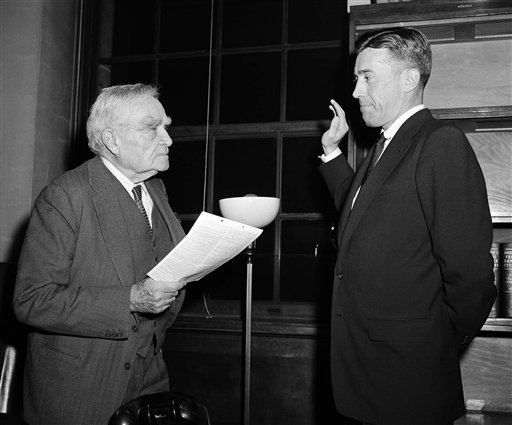 United States court of appeals Judge Learned Hand (left) administers oath of office to federal Judge Lawrence E. Walsh who is stepping into post of U.S. Deputy attorney general in 1957. Hand is responsible for the gravity of the evil test, a refinement of the clear and present danger test, which determines when free speech may be subject to criminal prosecution. (AP PhotoJJL, used with permission from the Associated Press.)