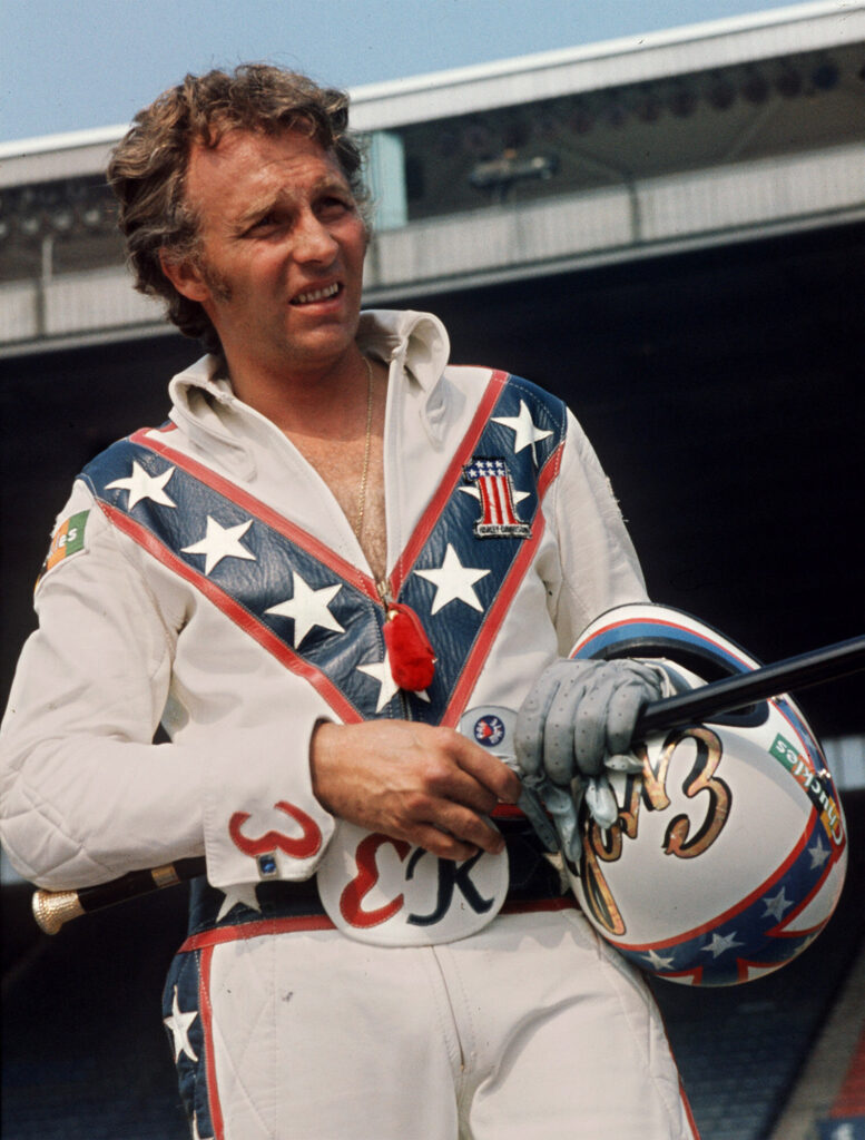 FILE - In this Aug. 20, 1974 file photo Daredevil motorcyclist Evel Knievel poses at the open-air Canadian national exhibition stadium in Toronto. (AP Photo/Chris O'Meara, File)
