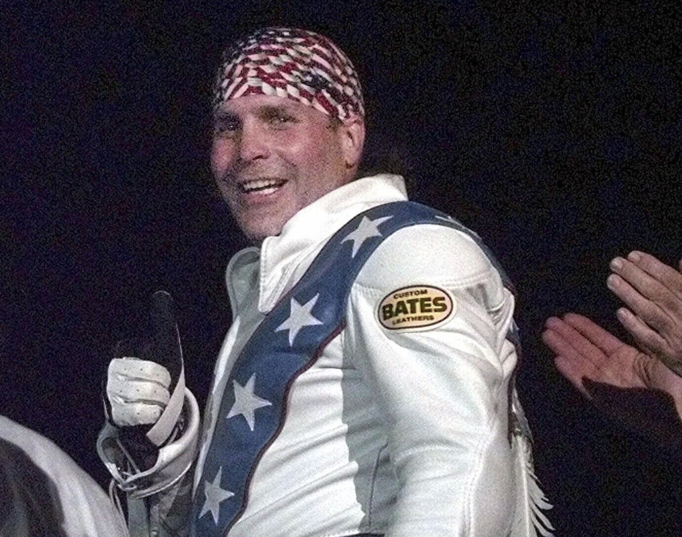 FILE - Robbie Knievel gives a thumbs up after jumping a train at the Texas State Railroad Park in Palestine, Texas on Feb. 23, 2000. Knievel, an American stunt performer, died early Friday at a hospice in Reno, Nev., with his daughters at his side, his brother Kelly Knievel said. He was 60. (AP Photo/LM Otero, File)