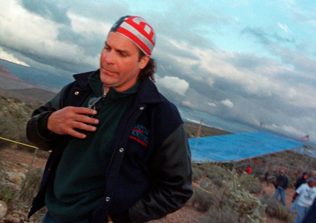 File - In this April 29, 1999, file photo, Robbie Knievel leaves his jump sight on the Hualapai Reservation in Ariz., after deciding not to make the Grand Canyon Death Jump due to high winds and cold weather. (AP Photo/Laura Rauch, File)