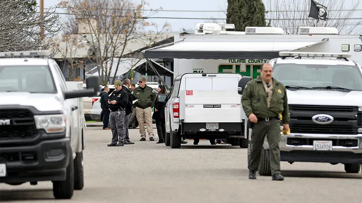 GOSHEN, CA - JANUARY 16: Tulare County Sheriff crime unit investigates the scene where six people, including a 6-month-old baby, her teenage mother and an elderly woman, were killed in a Central Valley farming community in what the local sheriff said was likely a targeted attack by a drug cartel on Monday, Jan. 16, 2023 in Goshen, CA. The massacre occurred around 3:30 a.m. in and around a residence in the Tulare County town of Goshen near Visalia. (Gary Coronado / Los Angeles Times via Getty Images) (Gary Coronado / Los Angeles Times via Getty Images)