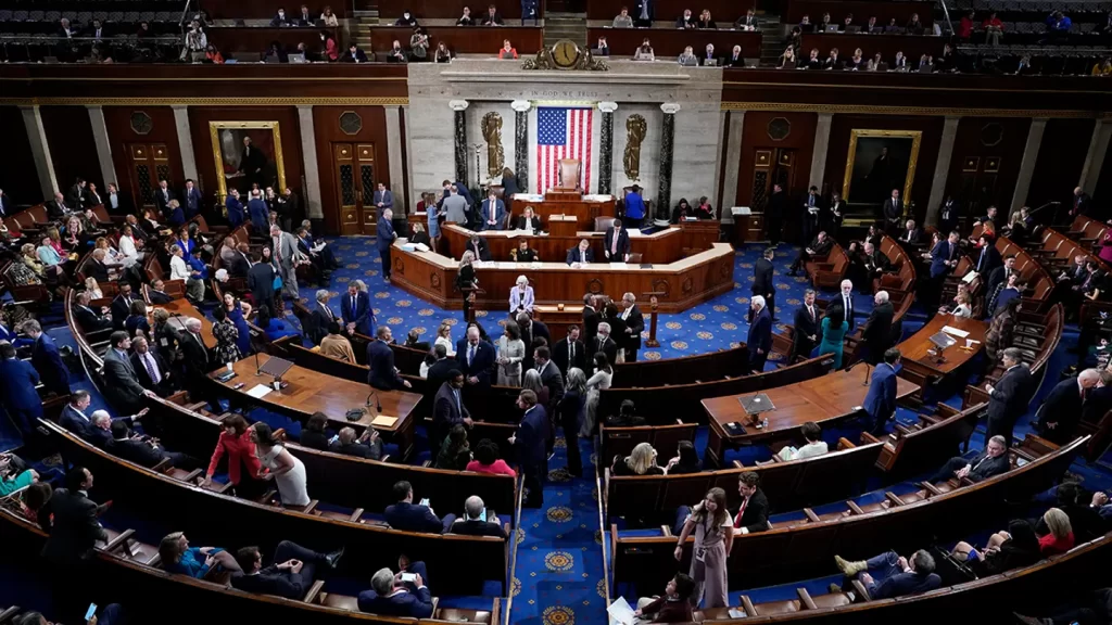 Members talk on the floor of the House Chamber on the opening day of the 118th Congress on Tuesday, Jan. 3, 2023, at the U.S. Capitol in Washington, D.C.  (Jabin Botsford/The Washington Post via Getty Images)