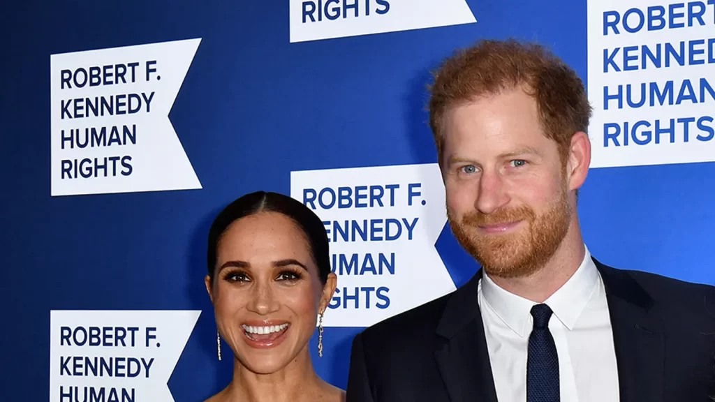 Prince Harry, Duke of Sussex, right, and Meghan, Duchess of Sussex, left, arrive at the 2022 Robert F. Kennedy Human Rights Ripple of Hope Award Gala at the Hilton Midtown in New York on Dec. 6, 2022. (Photo by ANGELA WEISS/AFP via Getty Images)