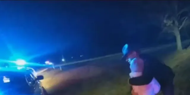 A trooper held the child and told her everything would be OK. (Ohio State Highway Patrol)