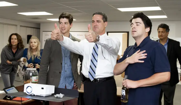 Todd Spitzer (center) gives the thumbs-up at his campaign headquarters in Santa Ana as election results showed he had closed the gap against his rival, incumbent district attorney Tony Rackauckas, in November 2018.