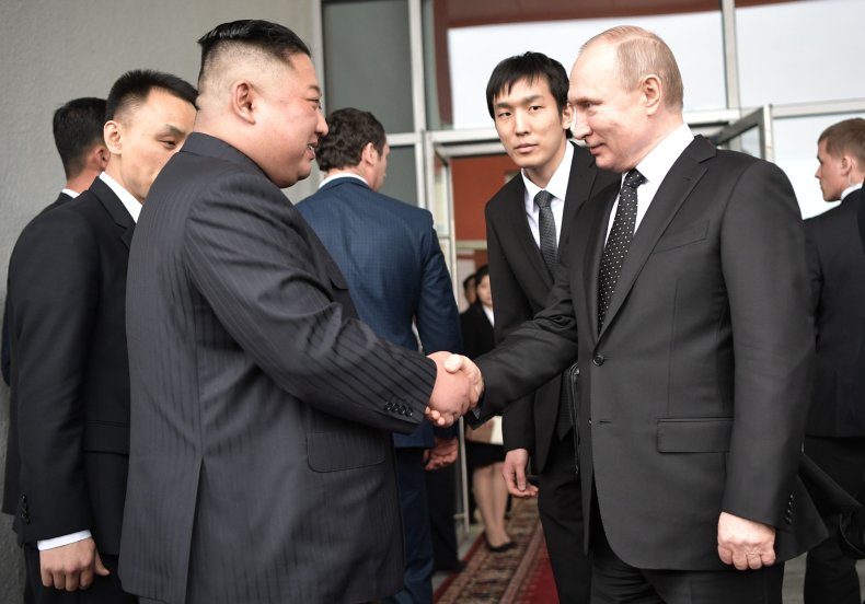 Russian President Vladimir Putin shakes hands with North Korean leader Kim Jong Un following talks in the far-eastern Russian port of Vladivostok on April 25, 2019. Russian Deputy Foreign Minister Andrey Rudenko has lauded North Korea for "firmly" supporting Moscow's ongoing invasion of Ukraine.ALEXEY NIKOLSKY/AFP VIA GETTY IMAGES