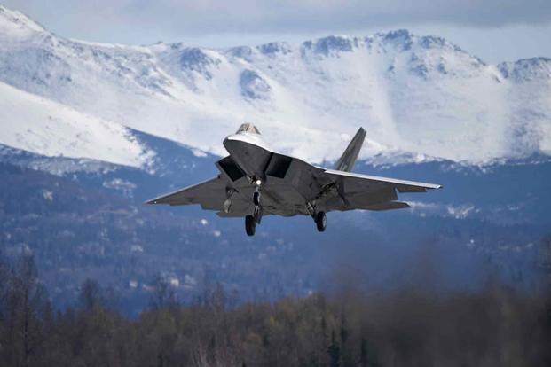A U.S. Air Force F-22 Raptor does a low fly-by before landing at Joint Base Elmendorf-Richardson, Alaska, May 7, 2018. (U.S. Air Force photo by Jamal Wilson)