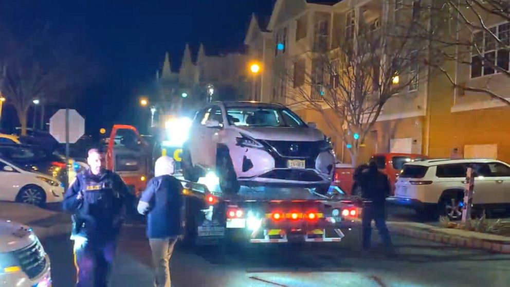 Police at the scene in Sayreville, N.J., Feb. 2, 2023, where city councilwoman Eunice Dwumfour was shot and killed in her car outside her home. Charlie Kratovil/New Brunswick Today