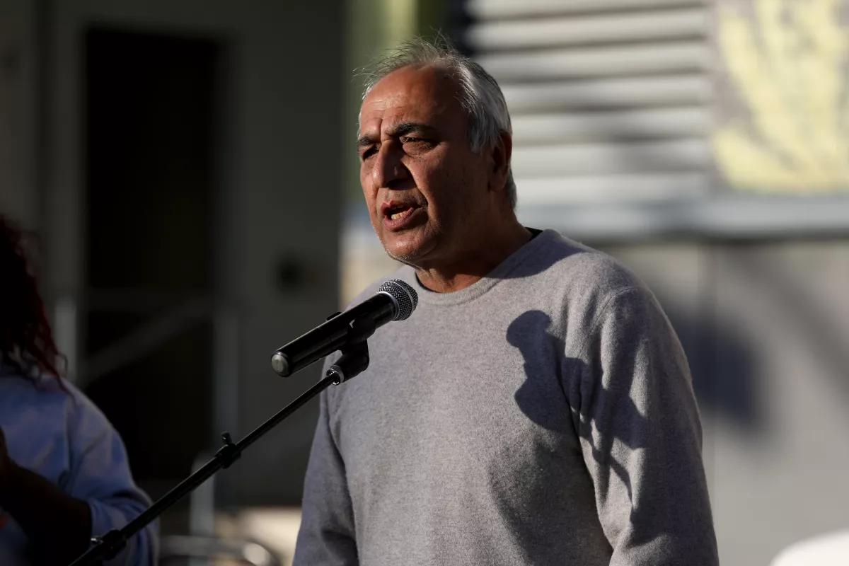 Hamid Khan of Stop LAPD Spying Coalition holds a Feb. 1 news conference with other organizations including Black Lives Matter to oppose Mayor Karen Bass’ decision to reappoint Los Angeles Police Chief Michel Moore.(Gary Coronado / Los Angeles Times)