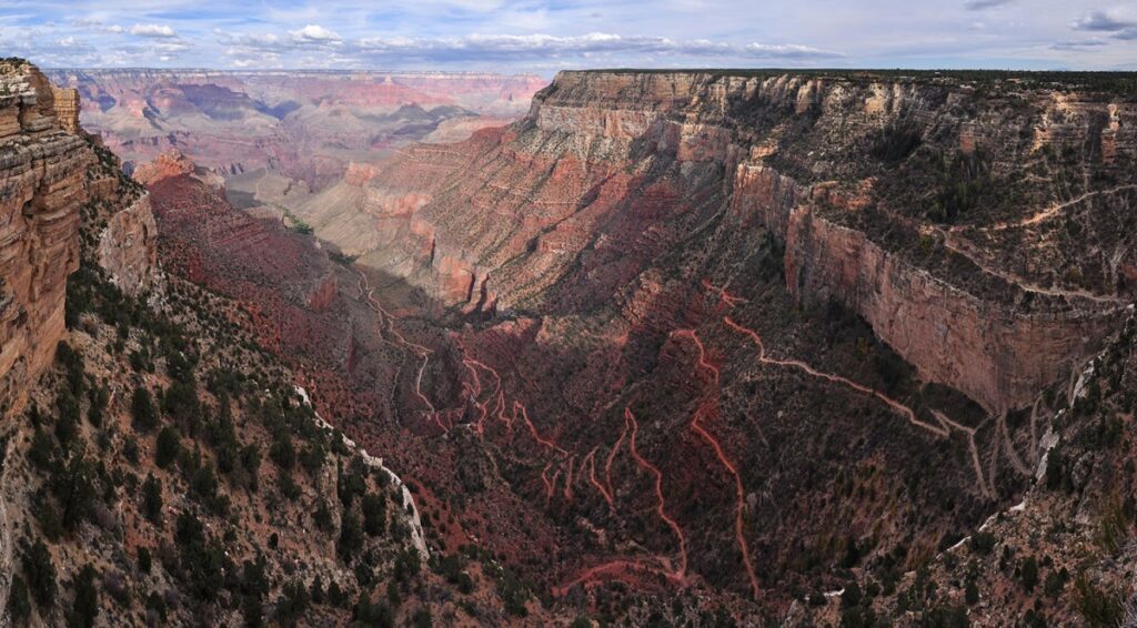 Bright Angel is Grand Canyon’s premier hiking trail. Its endless switchbacks descend in the canyon, giving hikers epic views that are framed by massive cliffs. Be sure to check the weather and come prepared with water before setting out on the trail. Photo by Michael Quinn, National Park Service.
