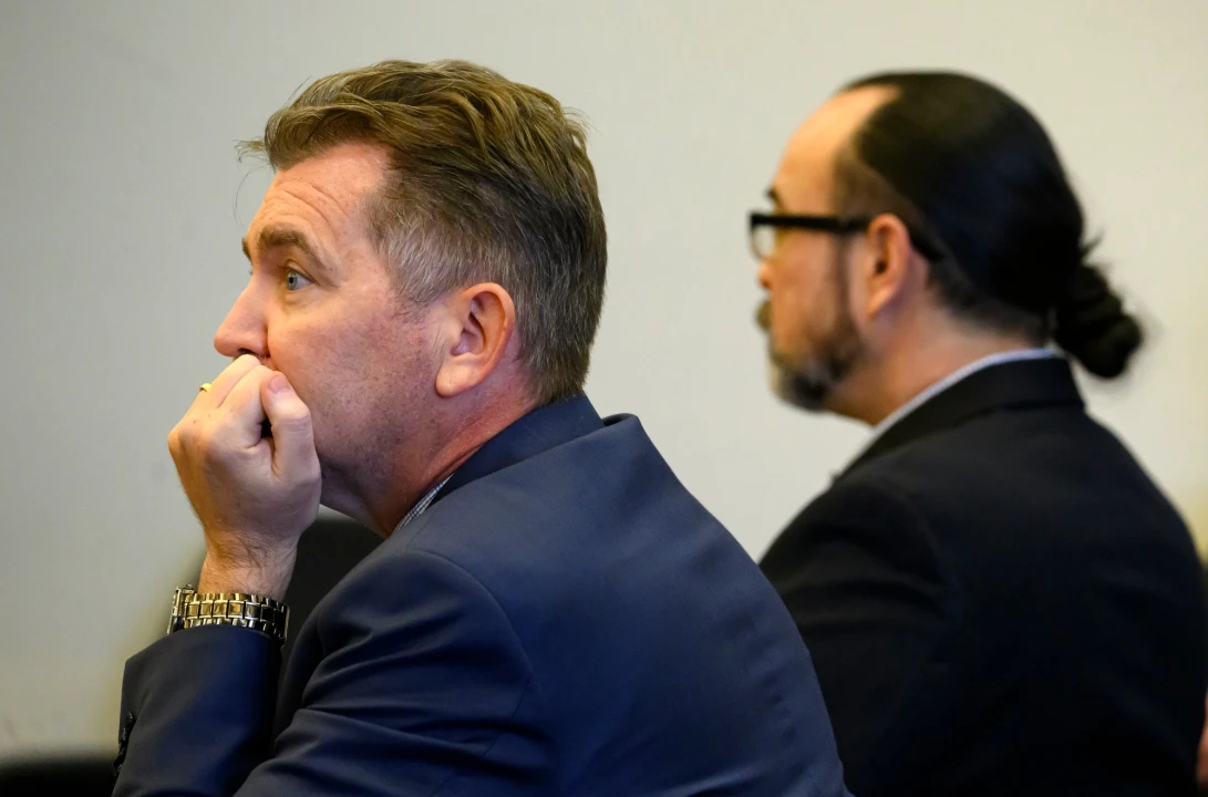 Alternate Defender Jason Phlaum, left, and his client, defendant Forrest Clark, listen to the state’s opening statement in Santa Ana on April 18. (Photo by Mindy Schauer, Orange County Register/SCNG)