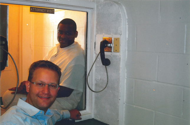 Brian Stolarz visiting his client Dewayne Brown in a Texas prison. Brown's case was featured in "The Innocence Files" series for the pervasive prosecutorial misconduct. Photo courtesy of Brian Stolarz