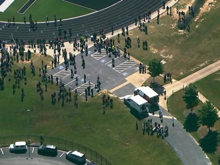 Students are seen outside Apalachee High School in Winder, Ga., on Sept. 4, 2024.