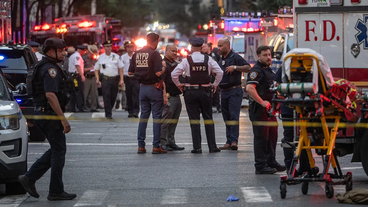 NYC shooting: NYPD officer killed, 3 others dead in midtown building home to Blackstone, NFL